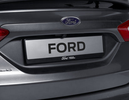 Genuine Ford Licence Plate Holder black, with Ford oval and white "Bring On Tomorrow" lettering - 2460006